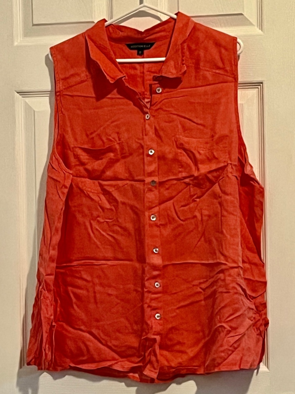 Casual sleeveless orange button down collared top